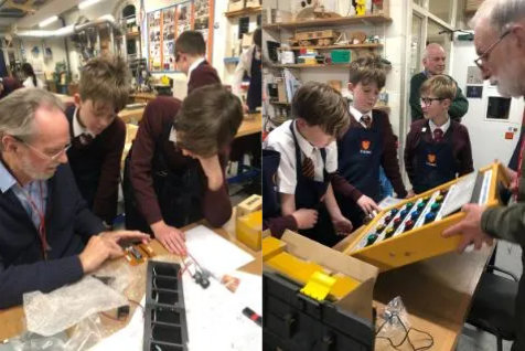 Students from Felsted School building an interactive dementia-friendly games console with volunteers from Remap Essex