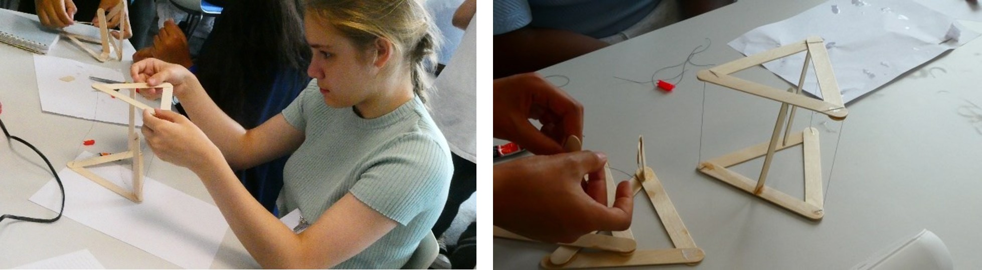 A student assembling triangles of lolly sticks into a structure held together with wires